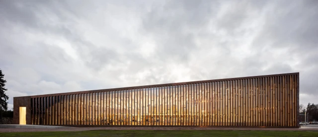 Kirkkonummi_LibraryOutside_Side_View_Nordic_copper-scaled